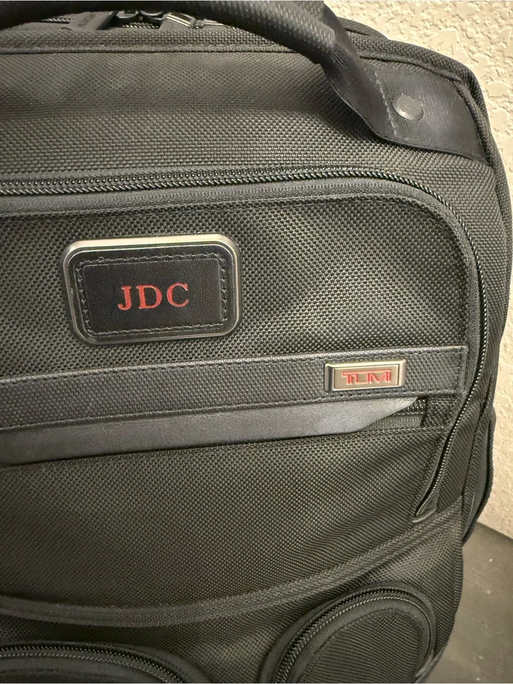 Tumi Black Backpack with JDC Patch